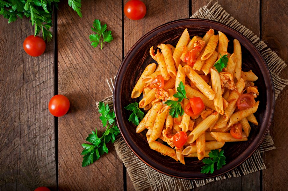 penne-pasta-tomato-sauce-with-chicken-tomatoes-wooden-table-960x637.jpg